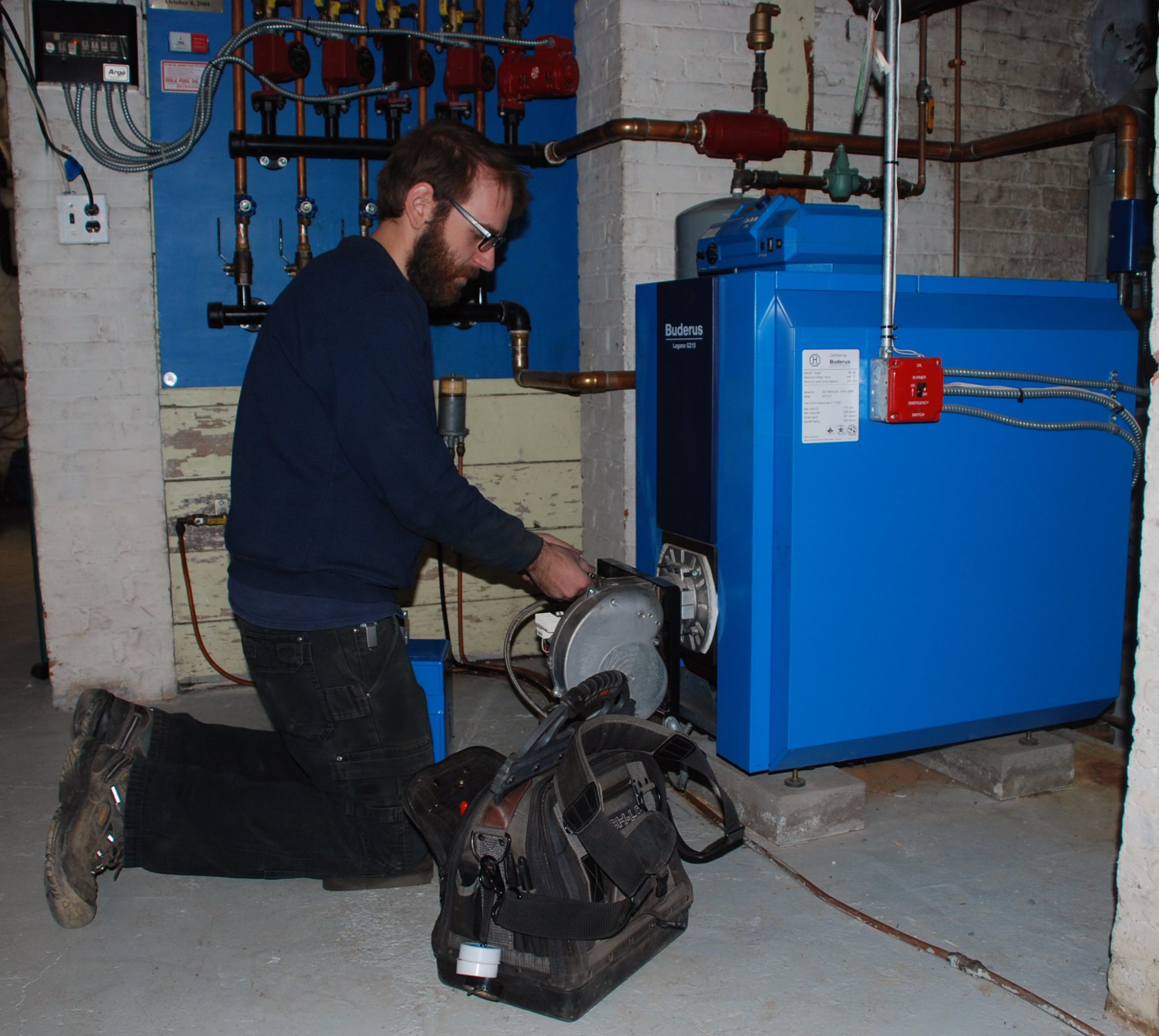 Dole Fuel Oil technician servicing a Buderus boiler