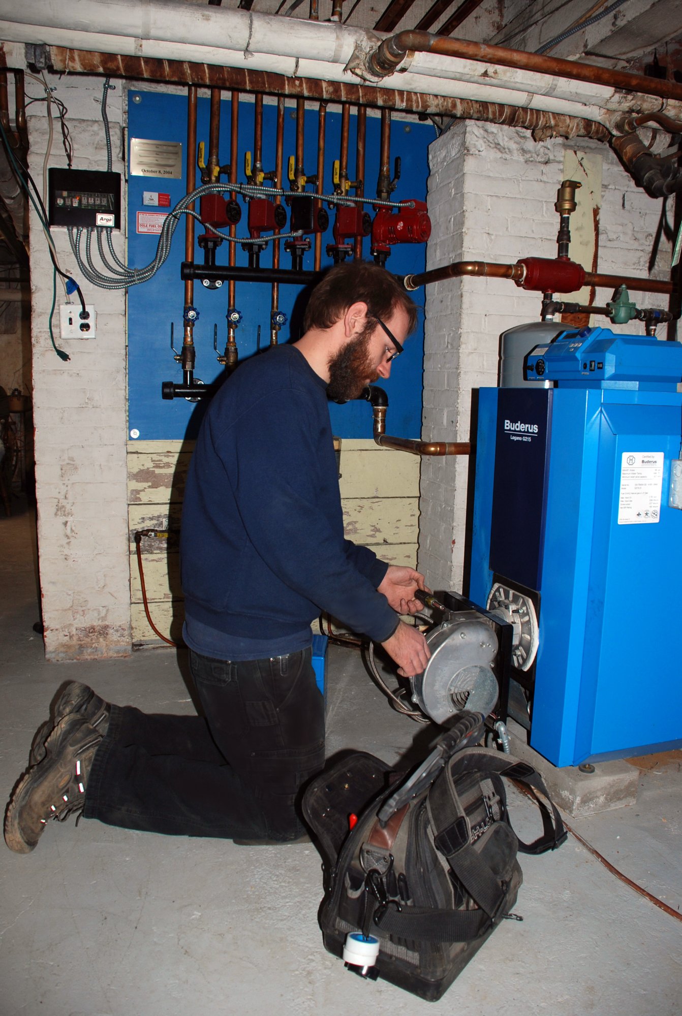 Dole Fuel Oil technician servicing Buderus boiler